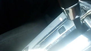Masturbating in parking lot with a bottle