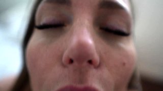 Busty curly brunette with big boobs fucks on couch