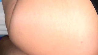 Big-ass Woman Shares a Bed with the Boss, Gives Him a Handjob, and They Have Sex.