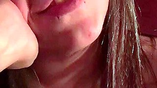 Amateur Babe in Glasses jerks cock for facial