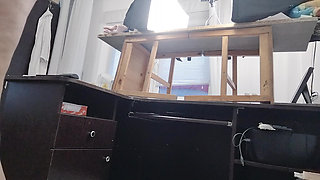 Sexy brunette doing naked chores around the house.