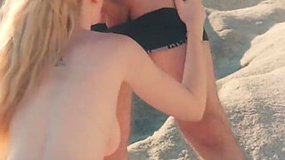 A Glimpse of Us Having Intimate Moments Outdoor on a Beach