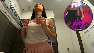 Bare-chested warm dark haired thin and naughty stunner in a pinkish mini micro-skirt to flash her fantastic rump and gams