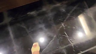 Tranny Ting xuan wanders and urinates outdoors.