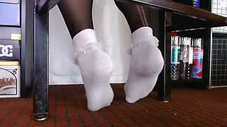 Ruffled Socks Over Black Pantyhose