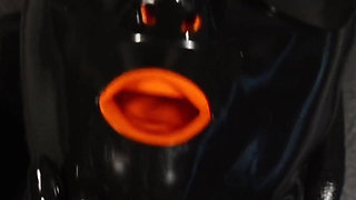 Rubber slut fucking her pussy