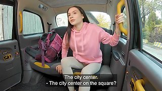 Petite brunette with a cute face is fucked in the taxi