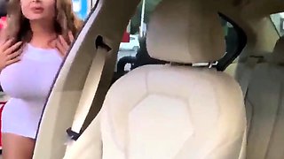 Blonde is flashing her big boobs in the outdoors