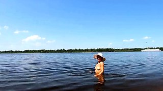 Blonde Solo Nudist Shows Off Tattoos by the River