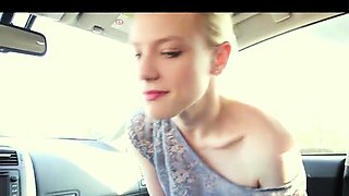 Pretty blonde girlfriend blows a big black dick in the car