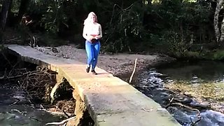 Blonde is flashing her big boobs in the outdoors