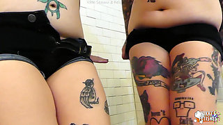 NIKKISFETISHES Two tattooed brunettes in lingerie pose together inside tiled bathroom