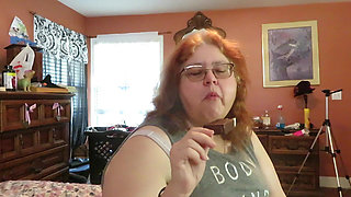 BBW nurse Vicki enjoys eatting a chocolate vanilla ice cream popsiscle