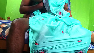 She shakes her relative's penis and rubs it on her breasts