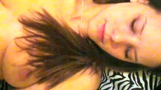 Small titted brunette teen fingering on the bed